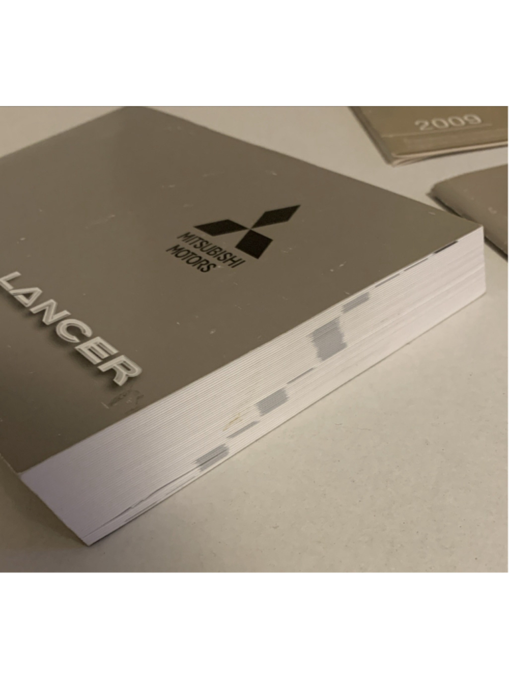 2009 Mitsubishi Lancer (Sedan / 2.0L / AT) Owners Manual - Hardly Used - Picture 6 of 12